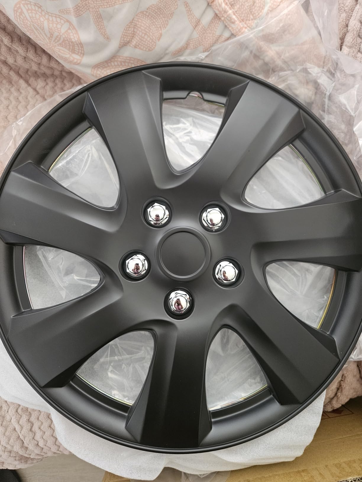 Nice hubcaps, but one came damaged